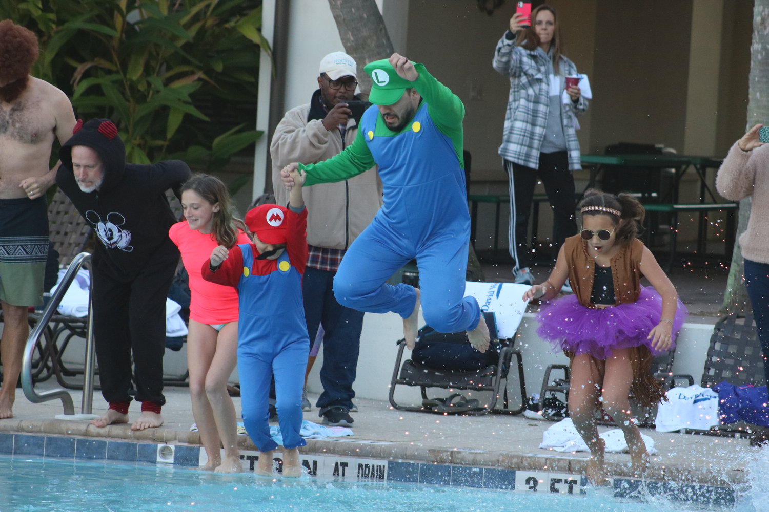 The 13th Annual Nocatee Polar Plunge was held Jan. 8 at Nocatee Splash Water Park. Many residents welcomed the new year by dressing up in costumes and diving into the water park’s main pool.